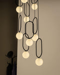 Modern Mid Century Black Ellipse Chandelier