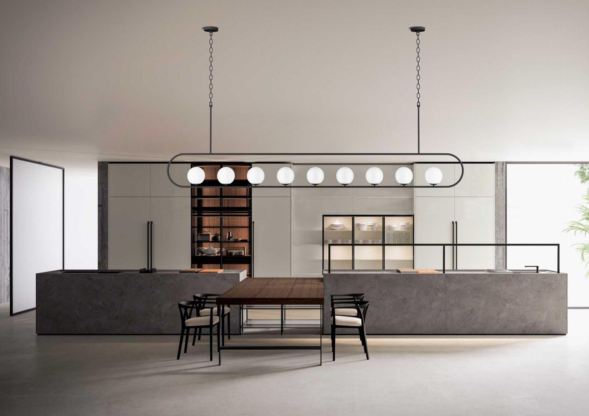 Modern 9-light linear globe chandelier in matte black powder coated finish with matte white glass globes for large dining rooms and commercial interiors.