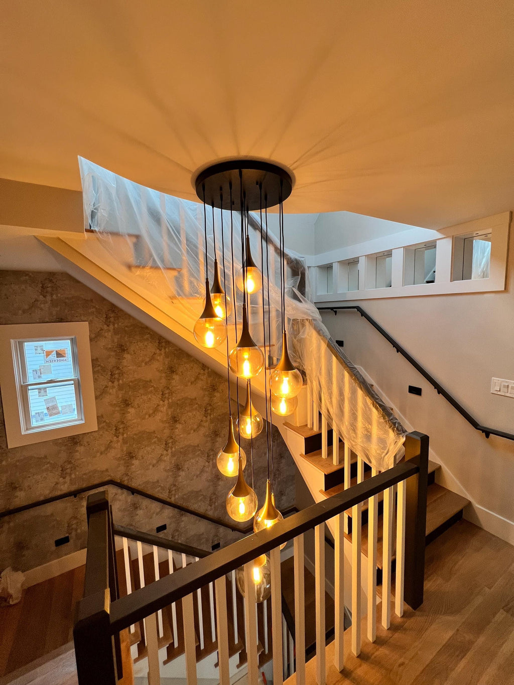 Modern Glass Multi-Pendant Light: Custom Stairwell Chandelier