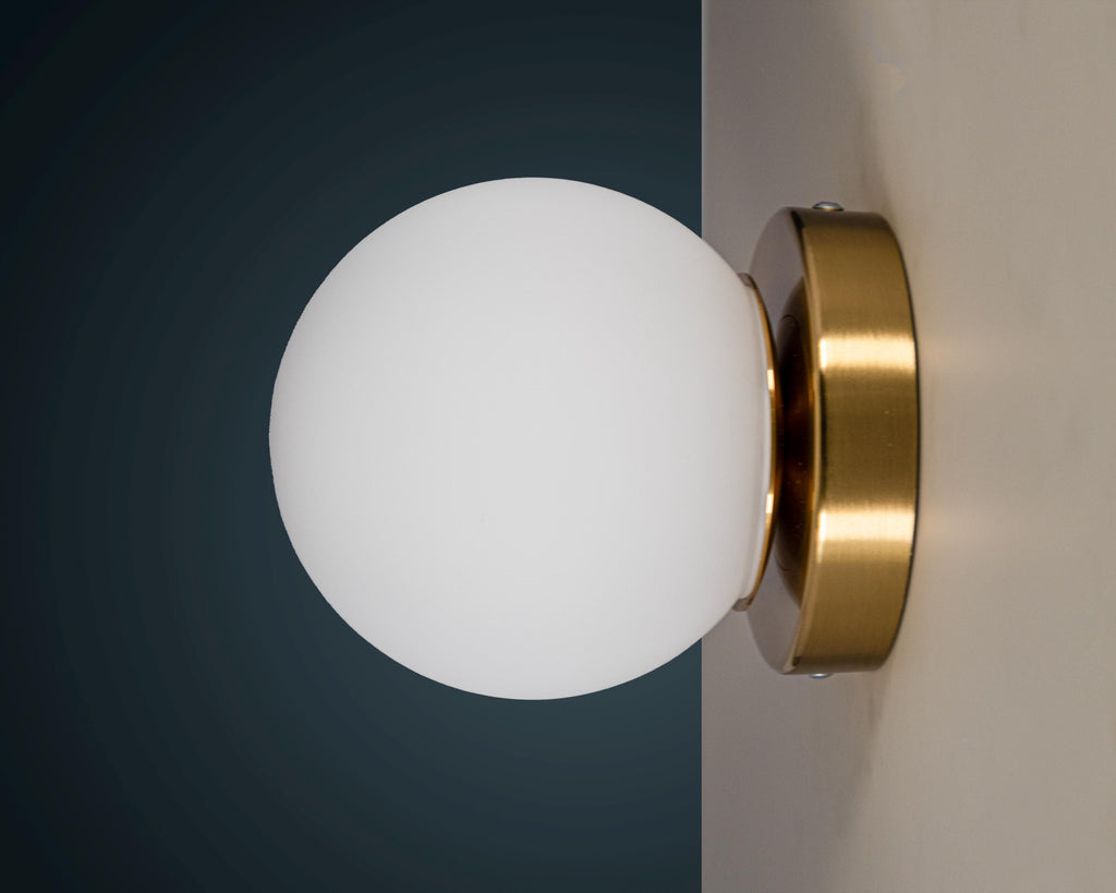 Opal Glass Globe Wall Sconce: Mid-Century Modern Brass Vanity Light