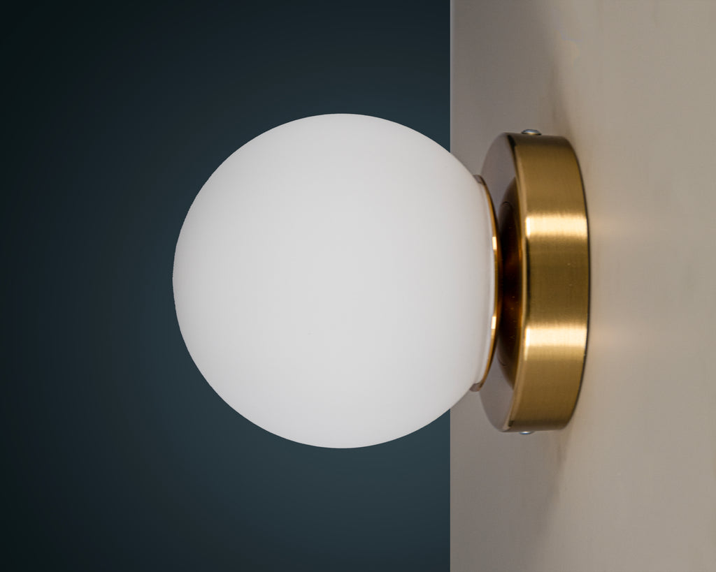 Opal Glass Globe Wall Sconce: Mid-Century Modern Brass Vanity Light