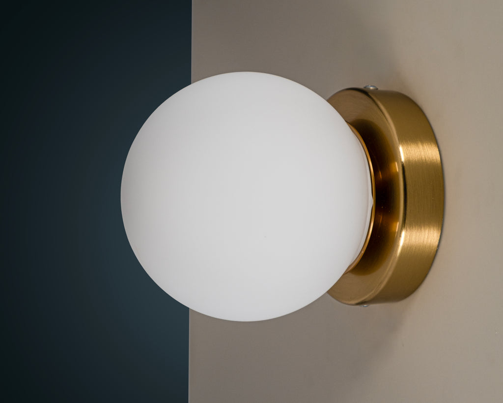 Opal Glass Globe Wall Sconce: Mid-Century Modern Brass Vanity Light