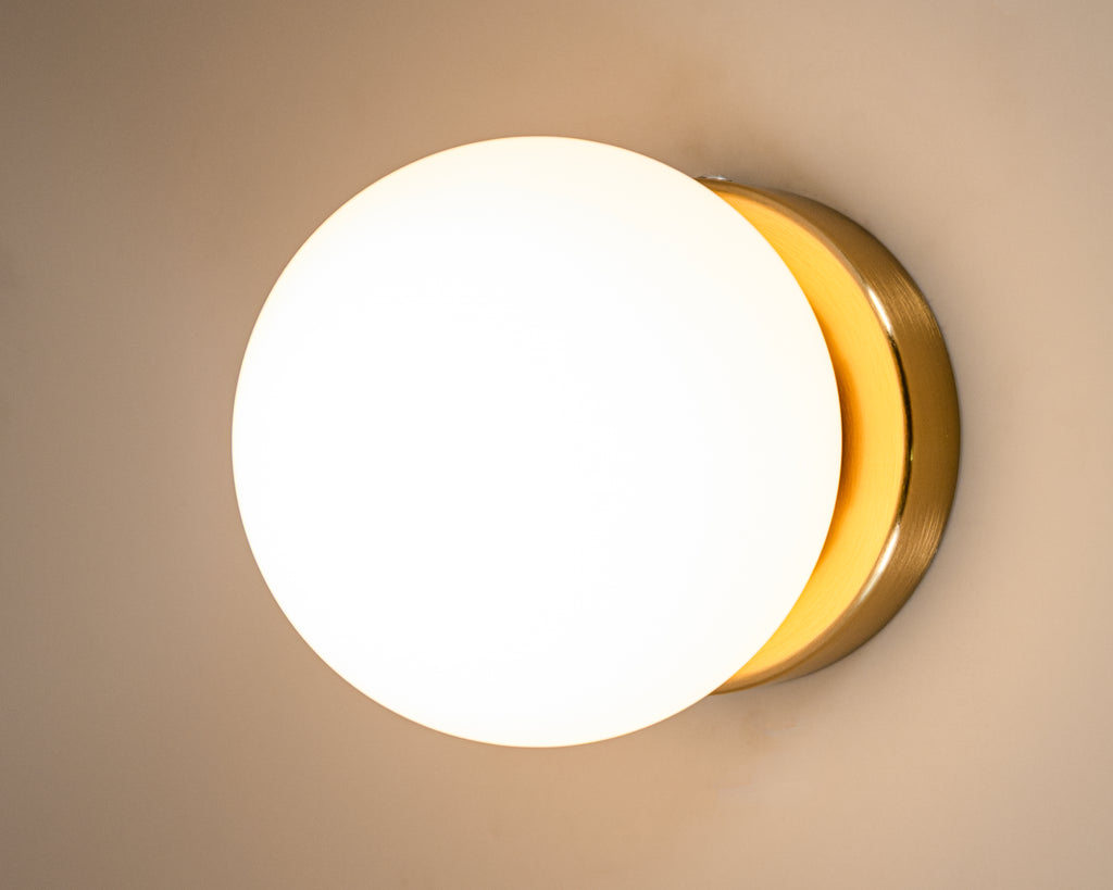Opal Glass Globe Wall Sconce: Mid-Century Modern Brass Vanity Light