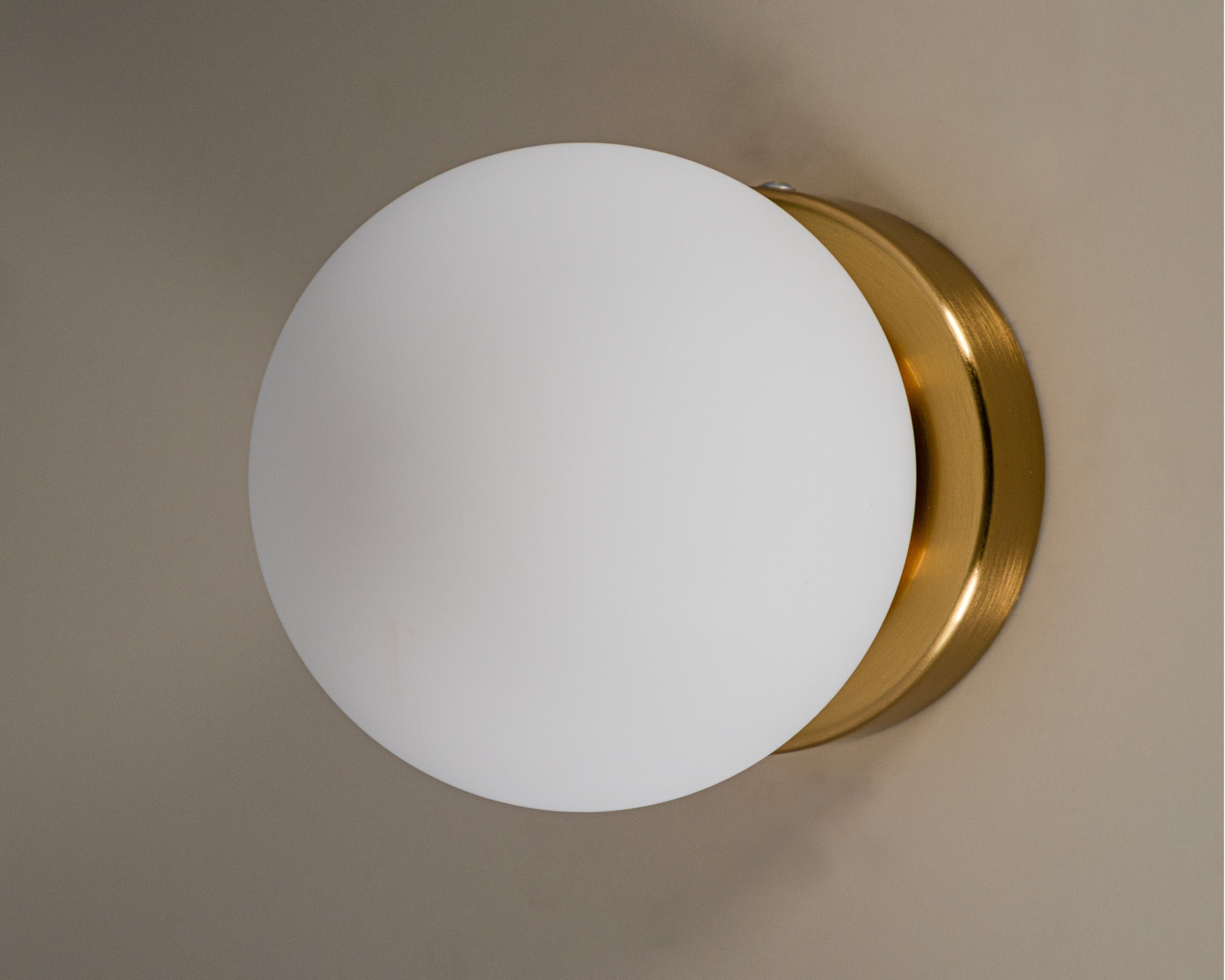 Opal Glass Globe Wall Sconce: Mid-Century Modern Brass Vanity Light