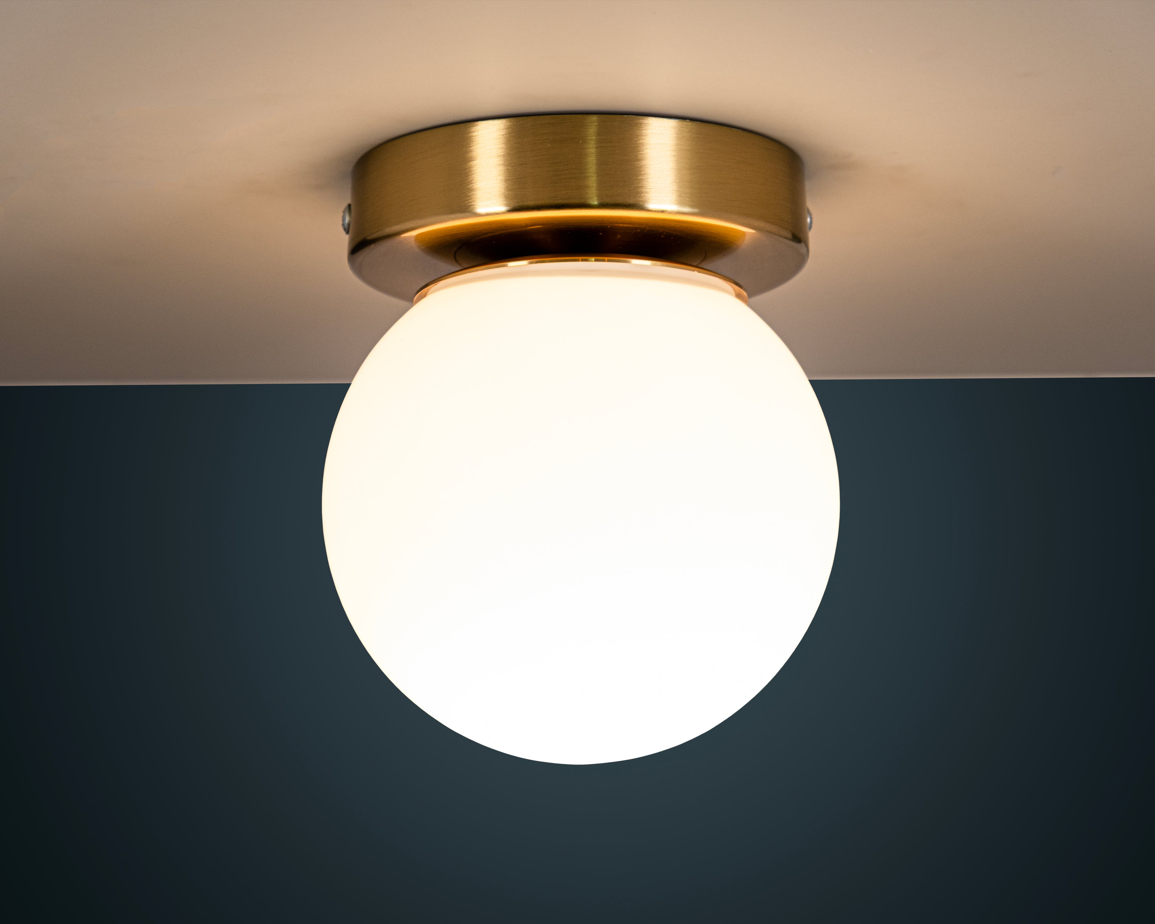 Opal Glass Globe Wall Sconce: Mid-Century Modern Brass Vanity Light